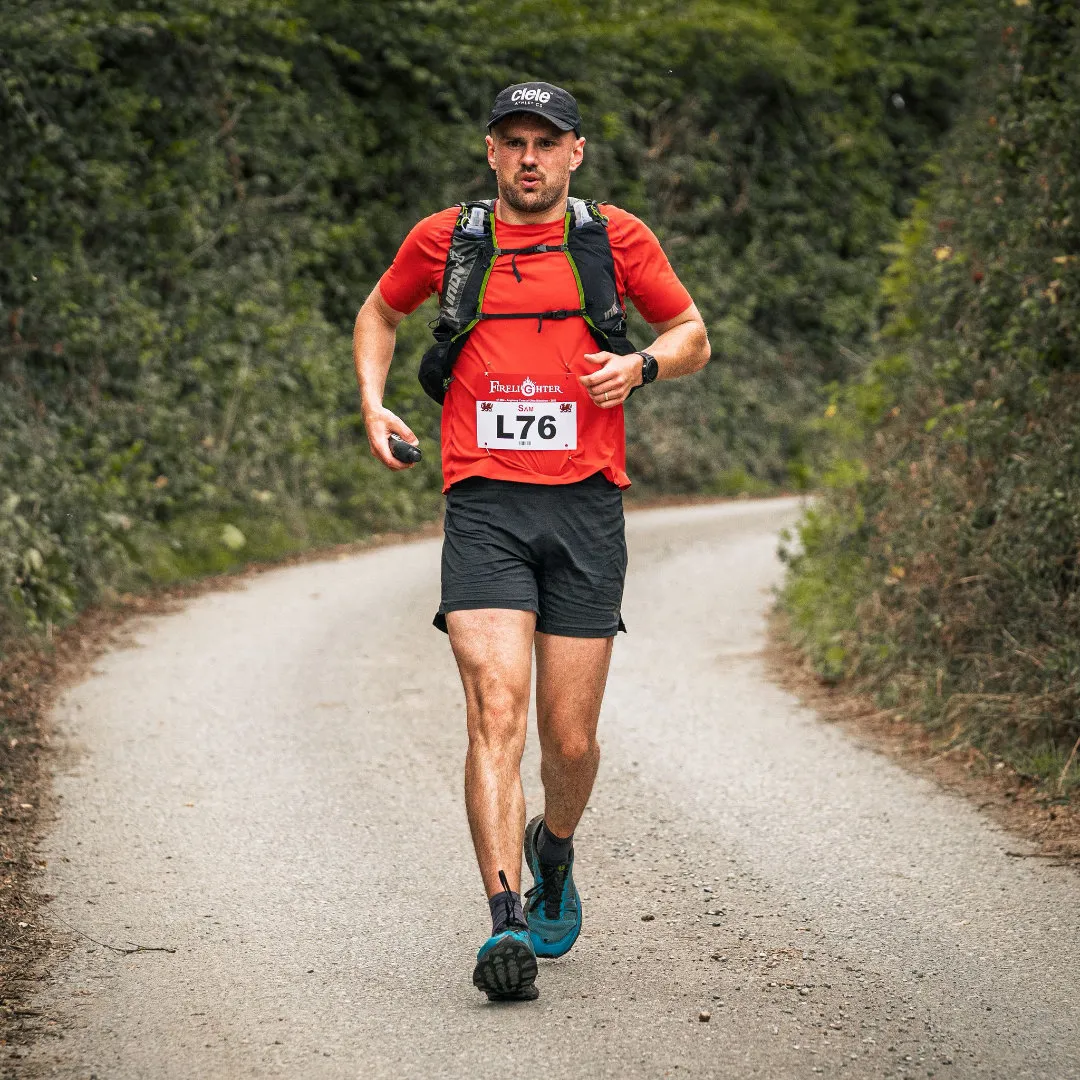 Sam running down a country road